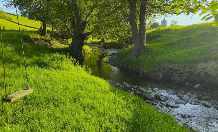 Enchanting 11 acre meadow on the edge of the historic village of Llanfihangel y Creuddyn in Wales.